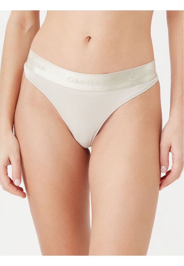 Calvin Klein Underwear Stringi 000QF7997E Beżowy. Kolor: beżowy. Materiał: bawełna