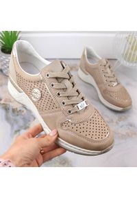 Buty damskie sportowe na koturnie ażurowe beżowe Rieker N4346-60 beżowy. Kolor: beżowy. Wzór: ażurowy. Obcas: na koturnie #9