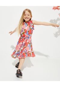ZIMMERMANN KIDS - Sukienka w kwiaty Poppy Flip 2-10 lat. Kolor: czerwony. Wzór: kwiaty. Sezon: lato. Typ sukienki: proste