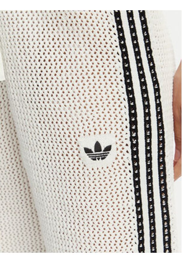 Adidas - adidas Spodnie dzianinowe Firebird KC6493 Biały Regular Fit. Kolor: biały. Materiał: syntetyk