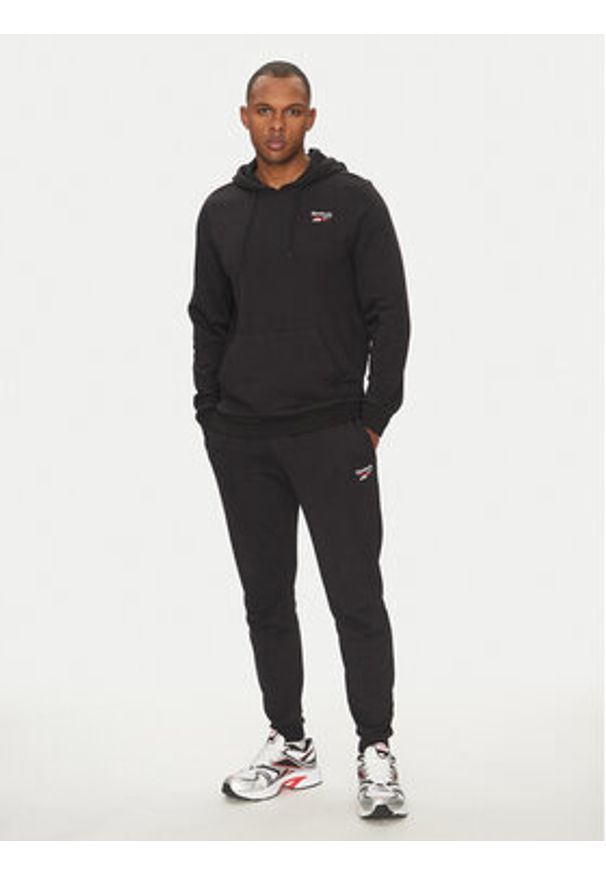 Reebok Spodnie dresowe 100221800 139-18-00 Czarny Regular Fit. Kolor: czarny. Materiał: bawełna