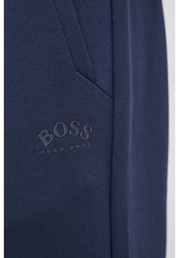 BOSS - Boss - Spodnie bawełniane. Kolor: niebieski. Materiał: bawełna