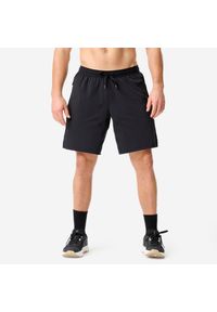 DOMYOS - Spodenki fitness Domyos. Kolor: czarny. Materiał: elastan, poliamid, materiał, poliester, guma. Sport: fitness #1