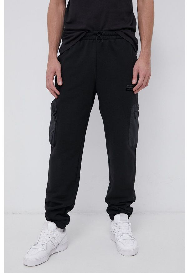 adidas Originals Spodnie męskie kolor czarny gładkie. Kolor: czarny. Wzór: gładki