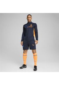 Puma - Męskie szorty treningowe Olympique Marsylia PUMA Club Navy Fluro Orange Pes Blue. Kolor: pomarańczowy, niebieski, żółty, wielokolorowy. Sport: piłka nożna