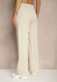 Renee - Beżowe Wiskozowe Spodnie o Szerokim Kroju Wiązanie w Pasie Falriza. Okazja: na co dzień. Kolor: beżowy. Materiał: wiskoza. Styl: casual, elegancki