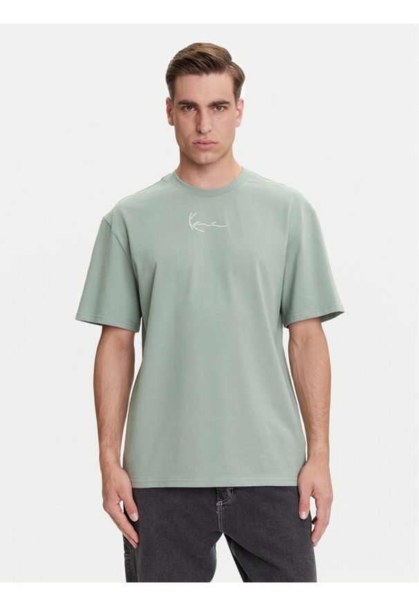Karl Kani T-Shirt Small Signature Essential PD00008142 Zielony Relaxed Fit. Kolor: zielony. Materiał: bawełna