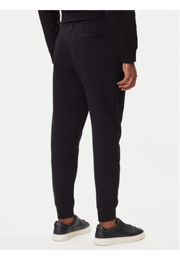 Armani Exchange Spodnie dresowe XM001886 AF10818 MC004 Czarny Slim Fit. Kolor: czarny. Materiał: bawełna