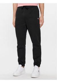 Tommy Jeans Spodnie dresowe Badge DM0DM18355 Czarny Regular Fit. Kolor: czarny. Materiał: bawełna