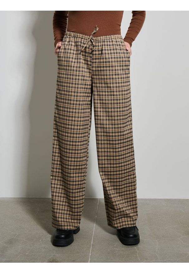 Sinsay - Spodnie wide leg w kratkę - wielobarwny. Wzór: kratka