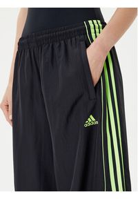 Adidas - adidas Spodnie dresowe Teamgeist adicolor JV7478 Czarny Oversize. Kolor: czarny. Materiał: syntetyk #3