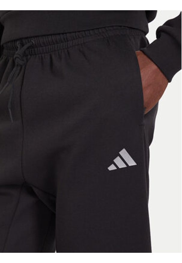 Adidas - adidas Spodnie dresowe Future Icons 3-Stripes JX1958 Czarny Regular Fit. Kolor: czarny. Materiał: bawełna