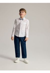 Reserved - Spodnie carrot fit - granatowy. Kolor: niebieski