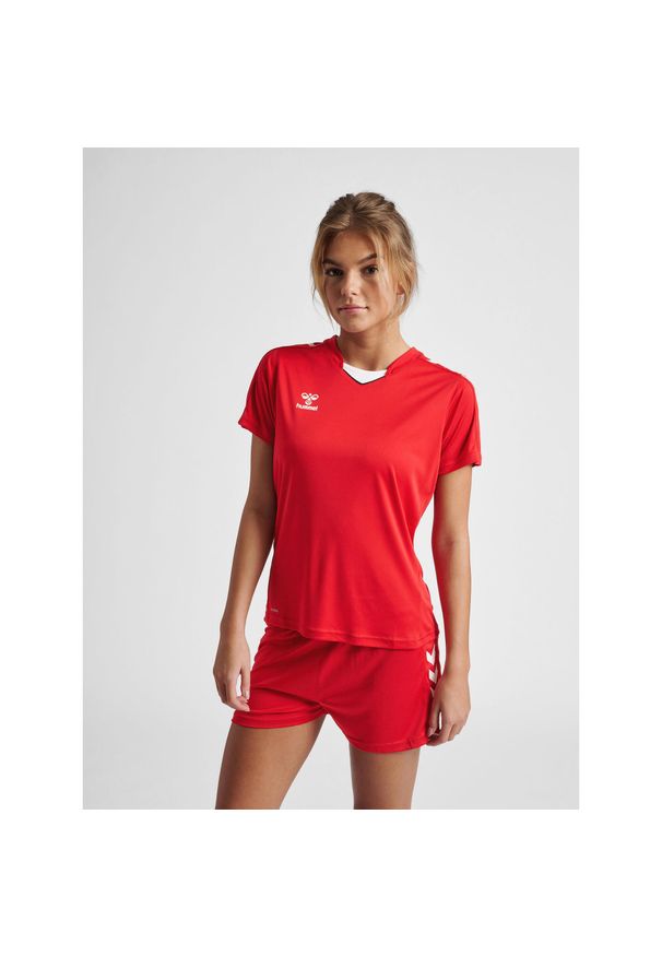 Damski poliestrowy dżersej Hummel Hmlcore XK. Kolor: czerwony, różowy, wielokolorowy. Materiał: jersey, poliester. Długość rękawa: krótki rękaw. Długość: krótkie. Sport: piłka ręczna