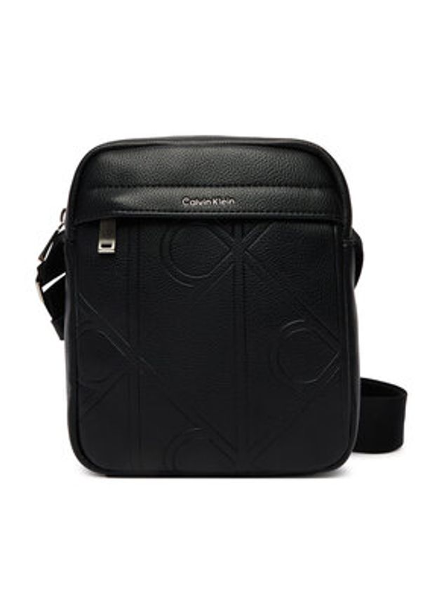 Calvin Klein Saszetka Emblem Aop Emboss Reporter LV04D3331G Czarny. Kolor: czarny. Materiał: skóra