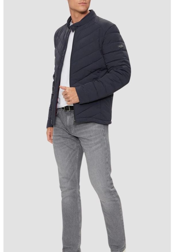 Guess - GUESS Granatowa męska kurtka Biker Jacket. Typ kołnierza: bez kaptura. Kolor: niebieski. Materiał: poliamid, syntetyk. Długość rękawa: długi rękaw. Długość: długie. Styl: wizytowy