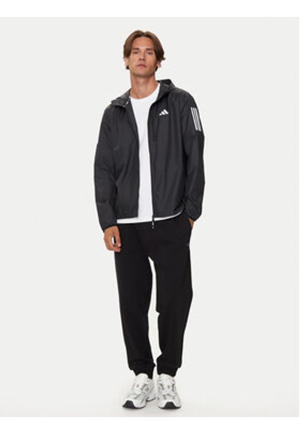 Adidas - adidas Kurtka do biegania Own The Run IN1483 Czarny Slim Fit. Kolor: czarny. Materiał: syntetyk. Sport: bieganie