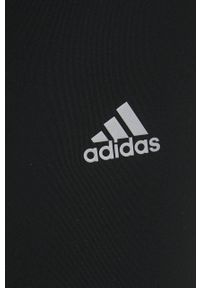 Adidas - adidas legginsy do biegania Running Essentials HD6763 damskie kolor czarny gładkie. Kolor: czarny. Materiał: skóra, dzianina, materiał. Wzór: gładki. Sport: bieganie