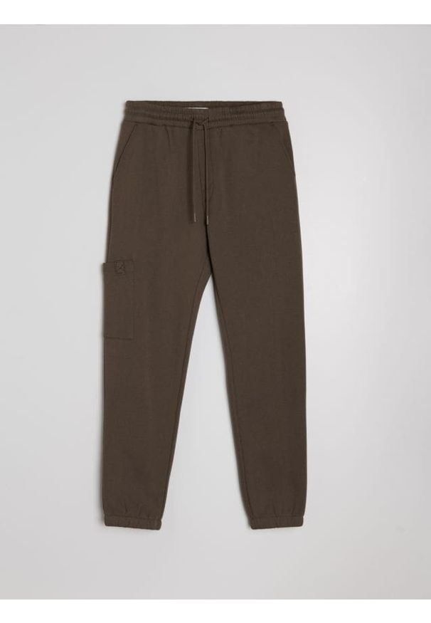 Sinsay - Spodnie jogger - brązowy. Kolor: brązowy