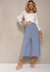 Renee - Niebieskie Bawełniane Spodnie Culottes z Szeroką Gumką w Pasie i Kwiatowym Printem Pellagia. Okazja: na co dzień. Kolor: niebieski. Materiał: bawełna. Wzór: kwiaty, nadruk. Styl: casual