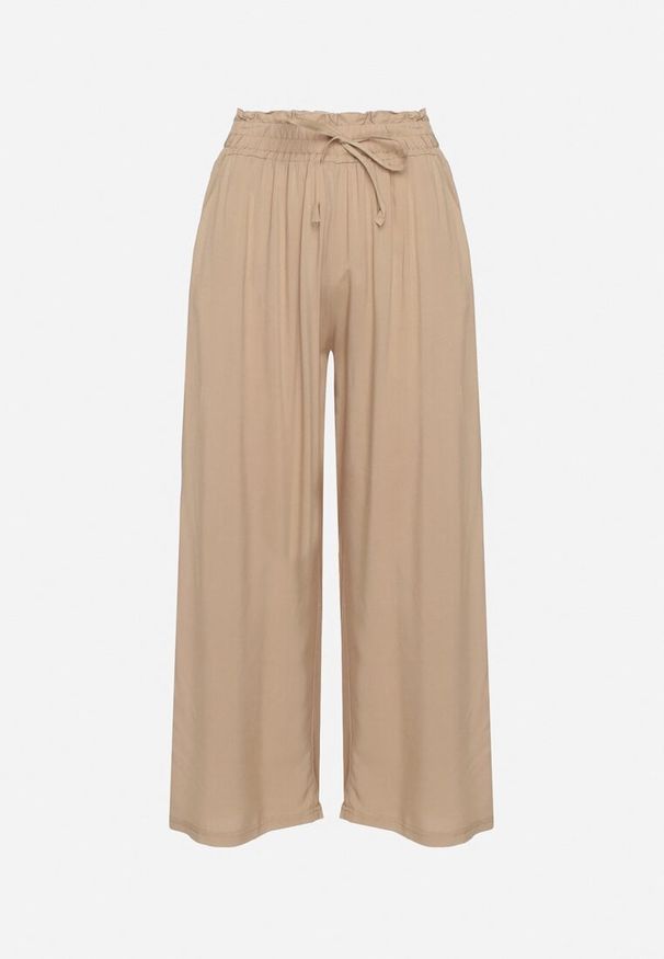 Born2be - Jasnobeżowe Bawełniane Szerokie Spodnie Palazzo z Wysokim Stanem i Gumką w Pasie Nellsie. Okazja: do pracy, na co dzień. Stan: podwyższony. Kolor: beżowy. Materiał: bawełna. Styl: elegancki, casual