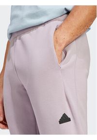 Adidas - adidas Spodnie dresowe Z.N.E. Premium IR5214 Fioletowy Regular Fit. Kolor: fioletowy. Materiał: bawełna, syntetyk #4