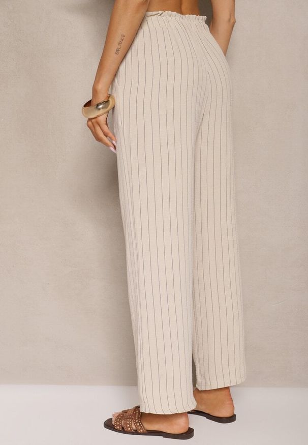 Renee - Jasnobeżowe Spodnie z Wiskozy High Waist Ozdobione Paskami Linariena. Okazja: na co dzień. Stan: podwyższony. Kolor: beżowy. Materiał: wiskoza. Wzór: aplikacja. Styl: klasyczny, elegancki, casual