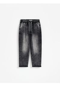 Reserved - Jeansy carrot fit - szary. Kolor: szary