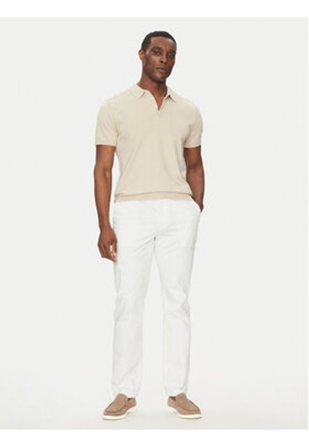 TOMMY HILFIGER - Tommy Hilfiger Chinosy Denton MW0MW37873 Biały Slim Fit. Kolor: biały. Materiał: bawełna