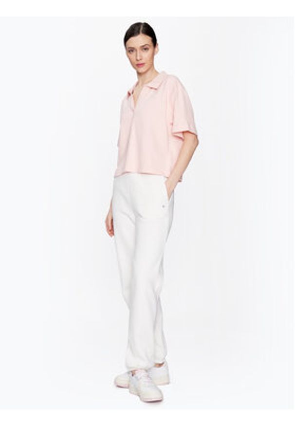Puma Polo Herpol 673108 Różowy Relaxed Fit. Typ kołnierza: polo. Kolor: różowy. Materiał: syntetyk, bawełna