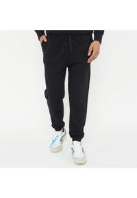 LEGEA - Spodnie sportowe Unisex F BALLON czarne. Kolor: czarny. Materiał: guma. Sport: fitness #1