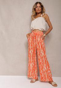 Renee - Pomarańczowe Spodnie z Szerokimi Nogawkami z Abstrakcyjnym Wzorem i Gumką w Pasie Sarieta. Kolor: pomarańczowy #1