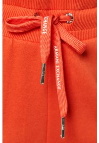 Armani Exchange - Spodnie. Kolor: czerwony. Materiał: bawełna, materiał, dzianina, elastan. Wzór: gładki #4