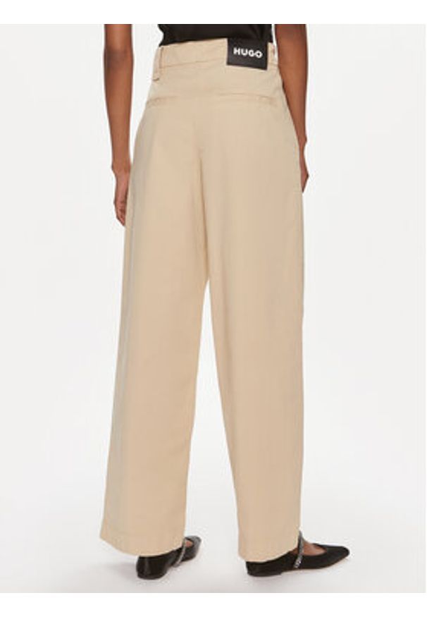 Hugo Spodnie materiałowe Hanico-1-D 50489241 Beżowy Relaxed Fit. Kolor: beżowy. Materiał: bawełna