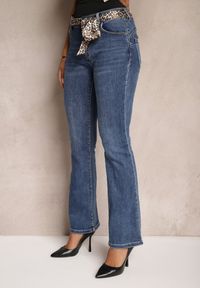 Renee - Niebieskie Jeansy Dzwony z Bawełny Ozdobione Paskiem Terilan. Okazja: na co dzień. Kolor: niebieski. Wzór: aplikacja. Styl: casual, retro, elegancki