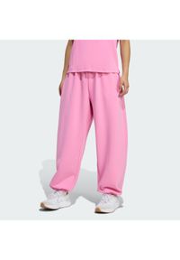 Adidas - adidas Spodnie dresowe Soft Lux KA7019 Różowy Loose Fit. Kolor: różowy. Materiał: syntetyk #1
