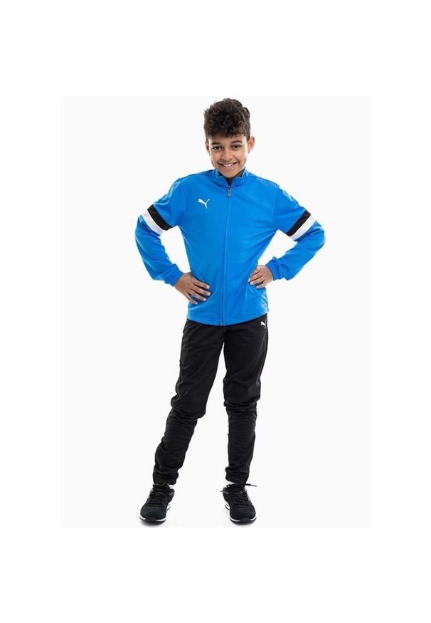 Dres treningowy chłopięcy Puma 65865502. Okazja: na uczelnię. Kolor: wielokolorowy, niebieski. Materiał: dresówka. Styl: sportowy