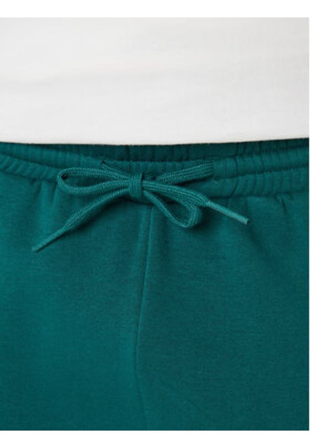 Adidas - adidas Spodnie dresowe Collegiate JM9178 Zielony Regular Fit. Kolor: zielony. Materiał: syntetyk, bawełna