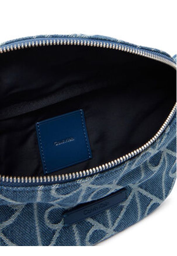 Calvin Klein Nerka Emblem Aop Denim Waistbag LV04D3430G Niebieski. Kolor: niebieski. Materiał: materiał