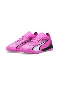 Buty piłkarskie męskie Puma Ultra Match It. Zapięcie: sznurówki. Kolor: biały, czarny, różowy, wielokolorowy. Materiał: syntetyk, materiał. Szerokość cholewki: normalna. Sport: piłka nożna