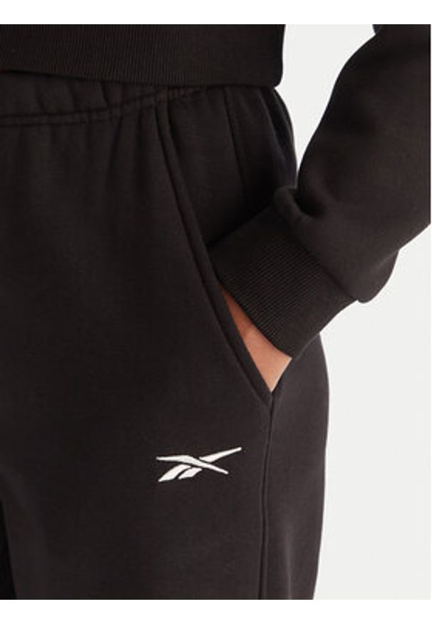 Reebok Spodnie dresowe Reebok X Ewa Chodakowska Evren RK25308CCW Czarny Regular Fit. Kolor: czarny. Materiał: syntetyk, bawełna