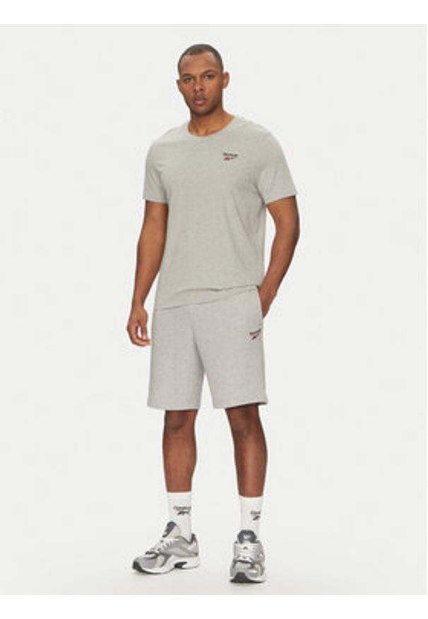 Reebok Szorty sportowe 100221793 Szary Regular Fit. Kolor: szary. Materiał: syntetyk. Styl: sportowy