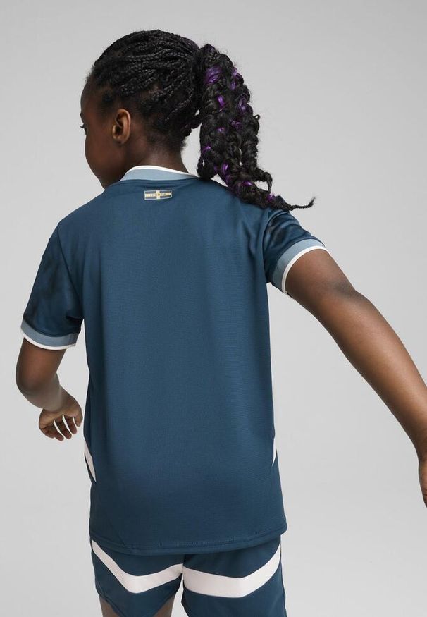 Puma - Dziecięca koszulka wyjazdowa OM 2024/25. Kolor: niebieski