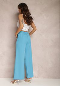 Renee - Niebieskie Spodnie Szerokie Laodaleia. Stan: podwyższony. Kolor: niebieski. Materiał: tkanina. Długość: długie. Wzór: gładki. Styl: elegancki