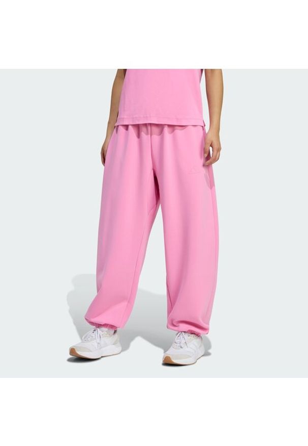 Adidas - adidas Spodnie dresowe Soft Lux KA7019 Różowy Loose Fit. Kolor: różowy. Materiał: syntetyk