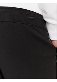 Calvin Klein Szorty sportowe Logo Tape K10K112964 Czarny Regular Fit. Kolor: czarny. Materiał: bawełna, syntetyk. Styl: sportowy