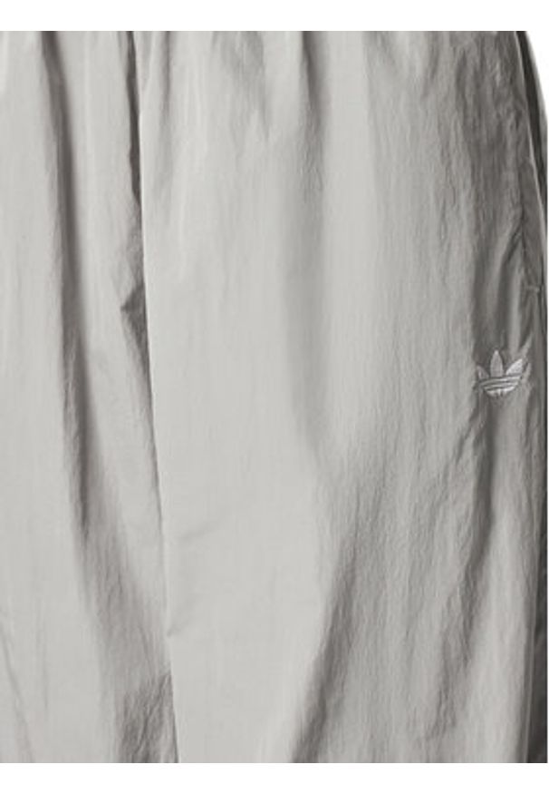 Adidas - adidas Spodnie dresowe adicolor Teamgeist JD0258 Szary Oversize. Kolor: szary. Materiał: syntetyk