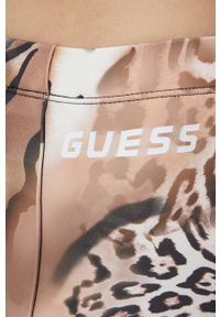 Guess legginsy damskie kolor brązowy wzorzyste. Stan: podwyższony. Kolor: brązowy. Materiał: włókno, materiał #4
