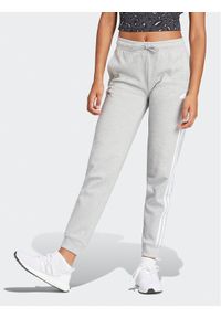 Adidas - adidas Spodnie dresowe Future Icons 3-Stripes IS3662 Szary Regular Fit. Kolor: szary. Materiał: bawełna, syntetyk