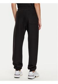 Champion Spodnie dresowe 220709 Czarny Relaxed Fit. Kolor: czarny. Materiał: bawełna